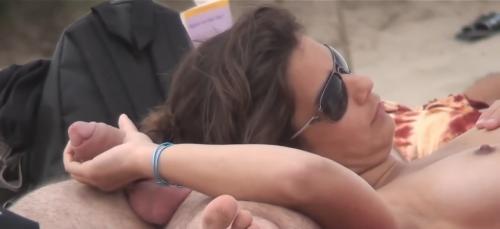 Sensual Handjob At The Nudist Beach